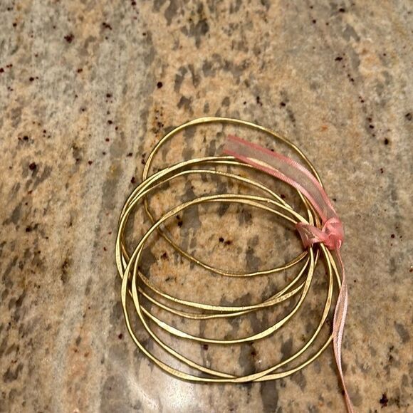 Jewelry - Woman's costume jewlery gold bracelets